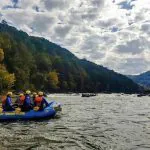 A raft launches into the Gauley River during an exciting excursion with River Expeditions.