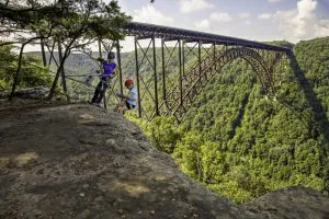 Climbers explore the New River Gorge National Park, a 30-minute drive from downtown Charleston.