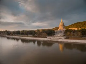 Sunlight glimmers on the gilded dome of the West Virginia statehouse.