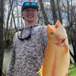Hunter Rohr, 15, of Buckhannon, West Virginia, has caught a golden rainbow trout that set state records for length and weight.