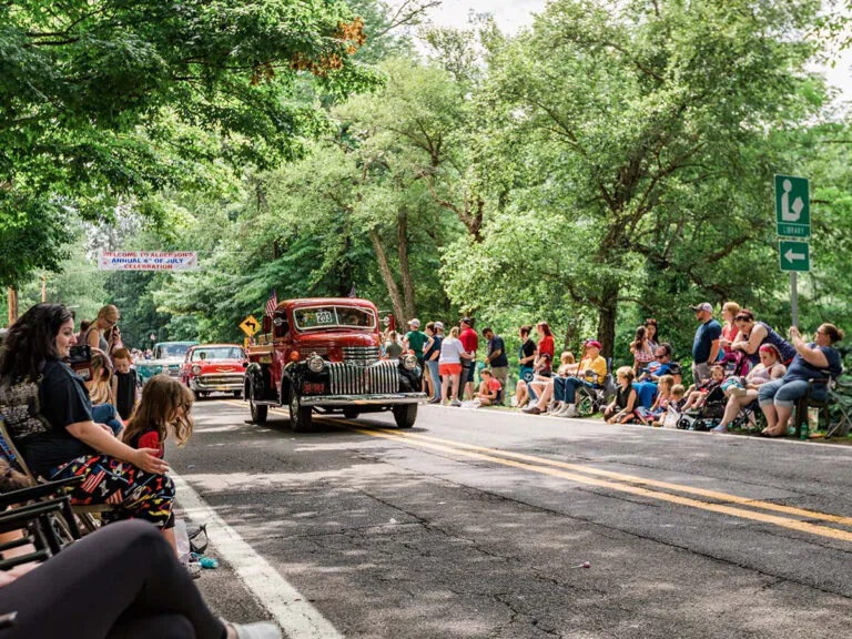 July 4 Festivals: Spectators line the streets of Alderson during the town's annual Fourth of July parade, one of West Virginia's longest-running Independence Day traditions.